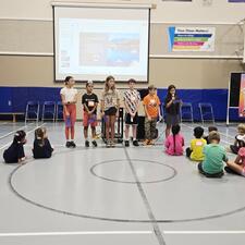 Grade 5 students leading the Terry Fox Assembly