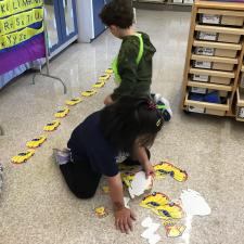 Students working on numeracy centers