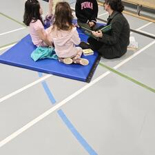 Literacy event- Parents reading to a group of students